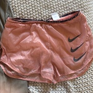 Nike Coral Running Shorts with Black Swoosh